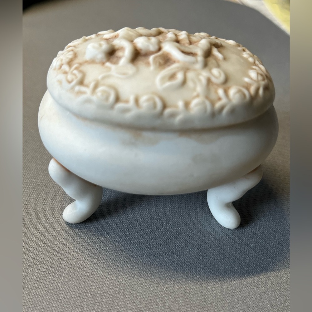 Lefton cherubs 207 bisque trinket oval box.  Lovely artistic piece.